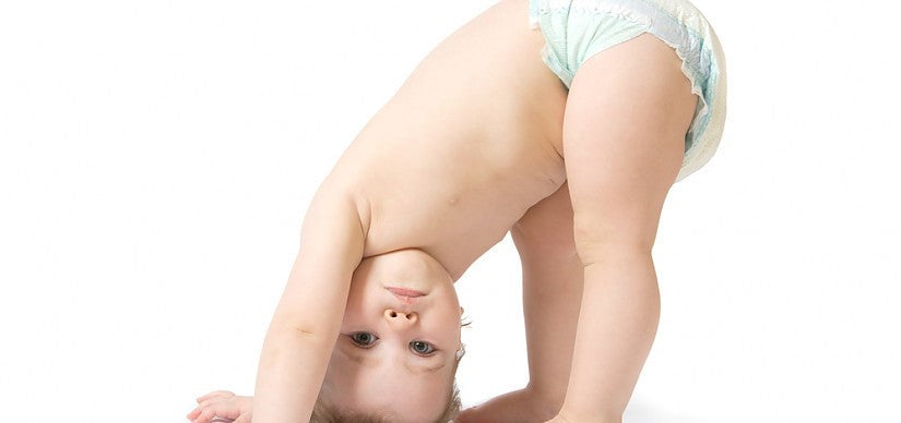 A parent caring for a baby's bottom