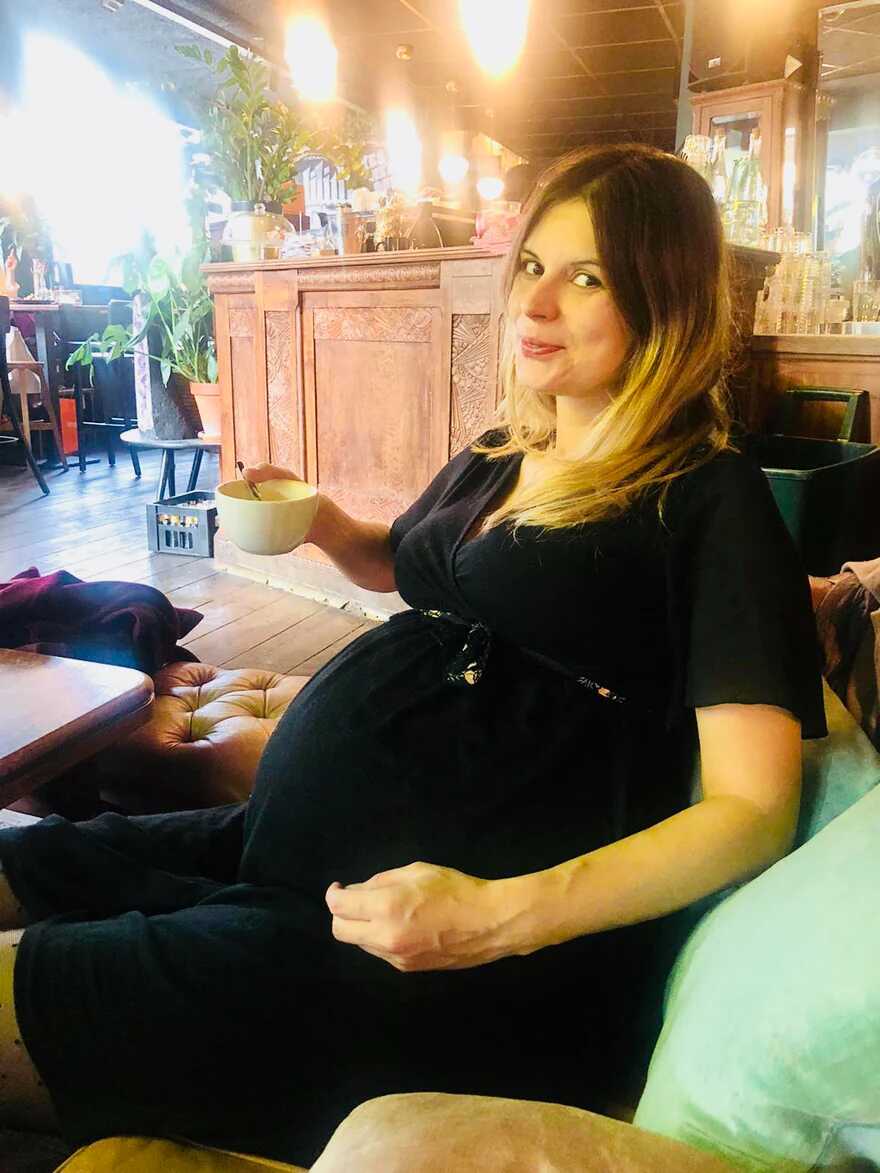 A pregnant woman celebrating her birthday